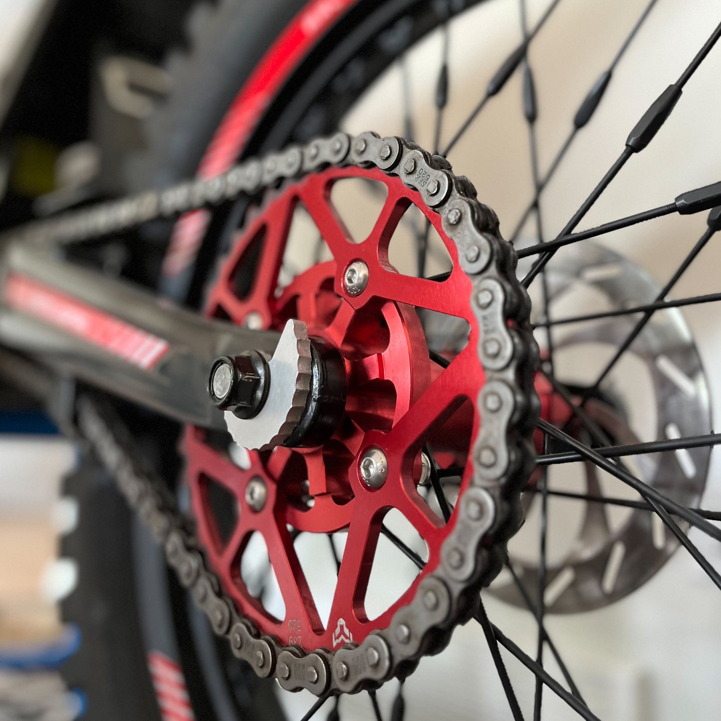 Red-official-arctic-leopard-dirt-bike-our brands-elusiveecycles-EXT-560-EXT620-EXT680-EXT800-chain